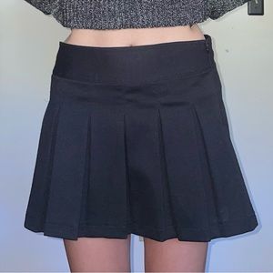Black pleated school girl skirt. Cherokee brand. Youth XL.